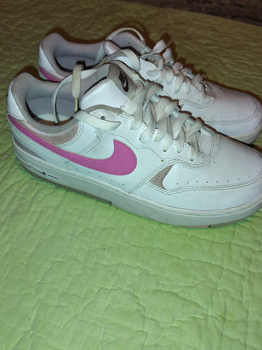 Nike Women’s White Athletic Sneakers with Pink Swoosh